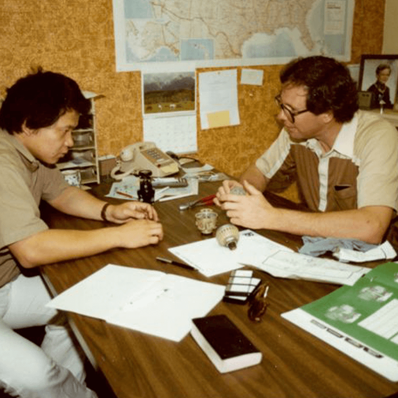 Dennis and Jesse working at a table