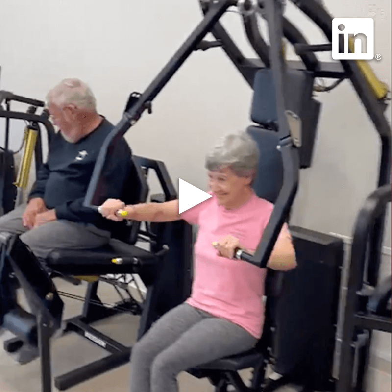 Thumbnail image of an older adult on the chest press machine