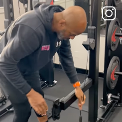 Thumbnail image of a different breed sports coach working out on the Rack